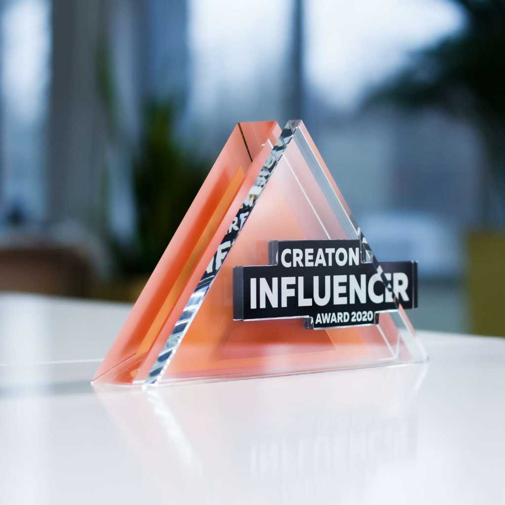 Fused glass, sandblasting and painting between layers. Polished after gluing.