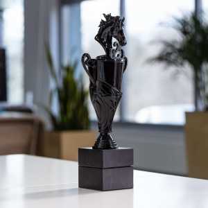 3D printed horse polished and painted in gloss black with a stone base