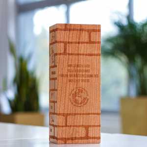 Wooden block: veneer cube with co2 laser surface engraving of bricks.